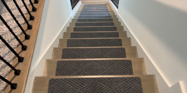 Slip-resistant stair treads enhance safety & add an aesthetic touch.