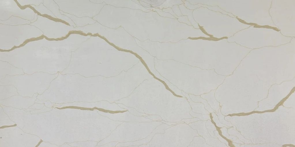 Santana Gold Quartz slab – Polished Finish Dimensions: 64" x 128" x 3cm
Max Yield: 56.88 sq ft