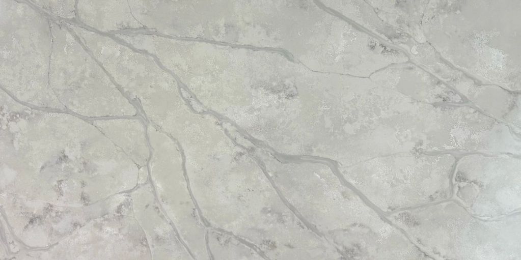 Blanco Perla Quartz slab – Polished Finish Dimensions: 64" x 128" x 3cm
Max Yield: 56.88 sq ft