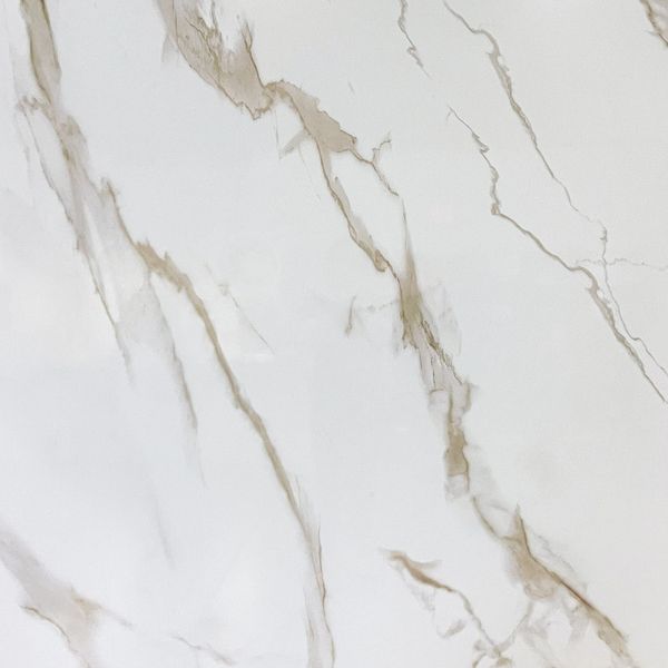 Marble surface with brown veins.
