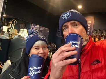 man and woman drinking coffee