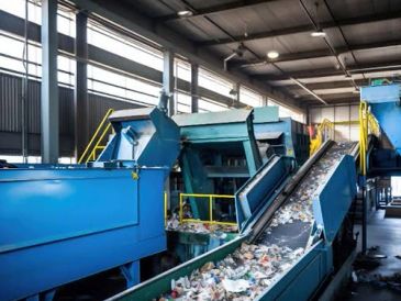 Industrial waste processing conveyor system.