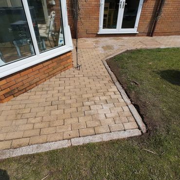 Block paved patio after pressure washing service