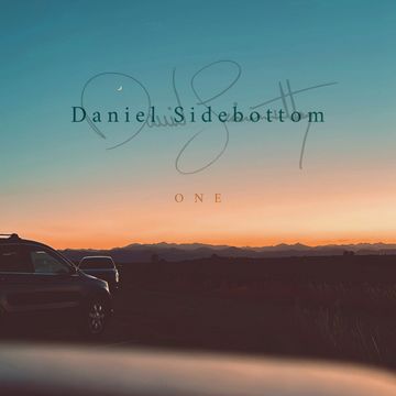 Sunset with cars and text overlay "Daniel Sidebottom One".