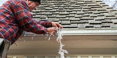 do not hang your own Christmas lights