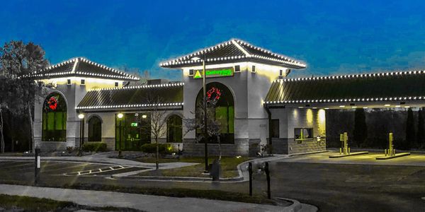 commercial bank building with LED Christmas holiday lights