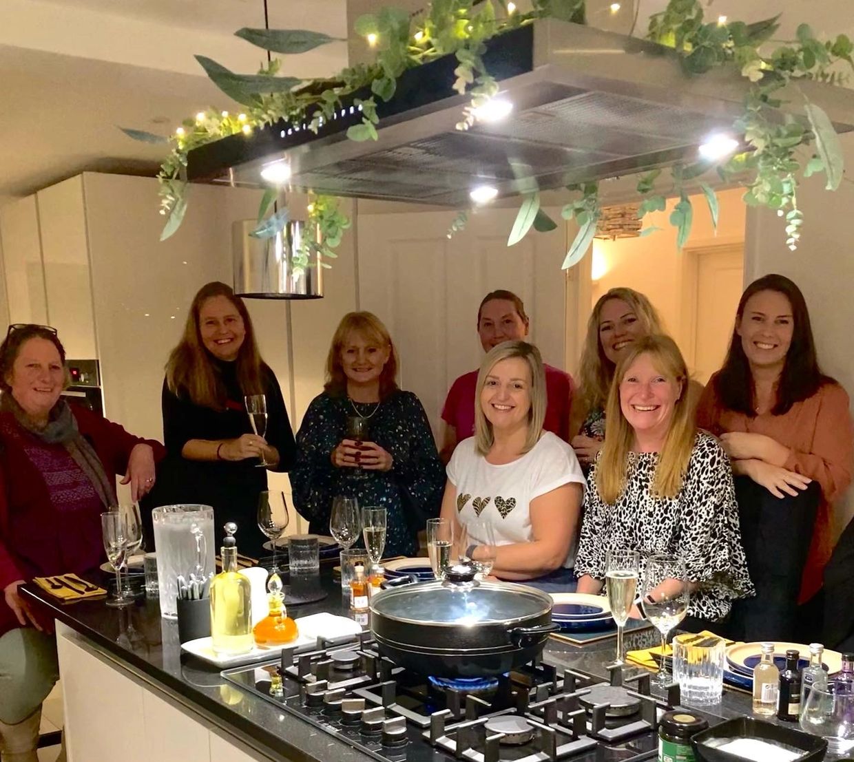 A picture of a group enjoying a celebration session In Anita's Kitchen for an Indian Private Dining