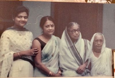 Anita with her Mother, Grandmother and Great Grandmother in her home in India.