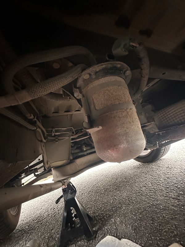 Draining a vans fuel tank and filter after water was put into the fuel in tiverton