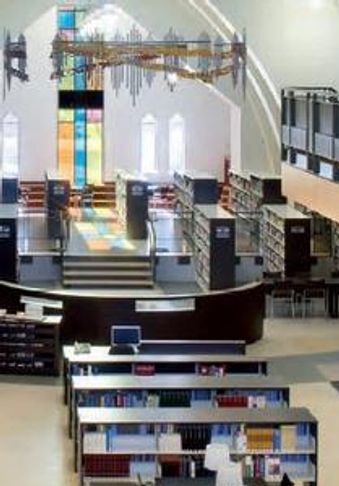 Large modern library interior view.