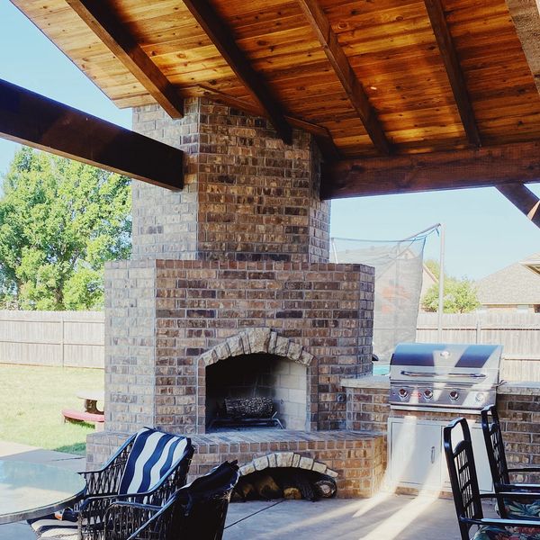 Custom Cedar Pavilion, Outdoor Fireplace, Outdoor Kitchen, Natural Stone Countertop, Bull Appliances
