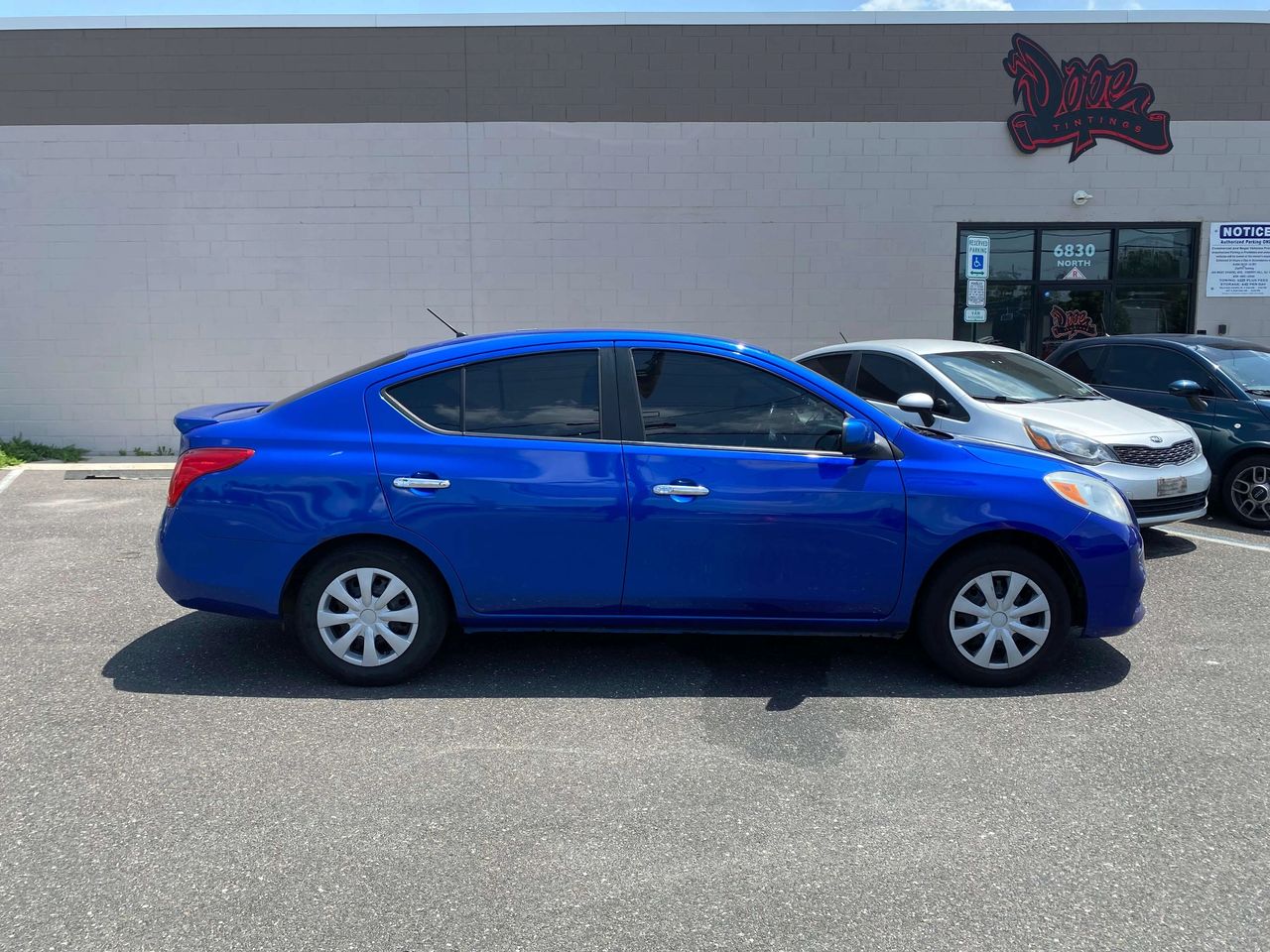 2013 Nissan Versa 20% window tint at Dope Tintings