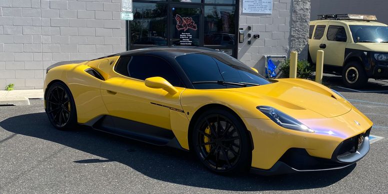 Yellow Maserati MC20 at Dope Window Tinting in Pennsauken, NJ.