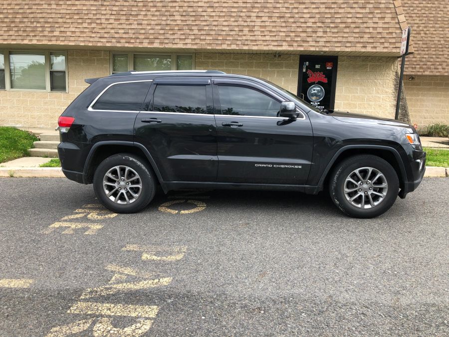 Jeep Grand Cherokee/SRT 8 window tint job 5 — Dope Tintings Pennsauken NJ