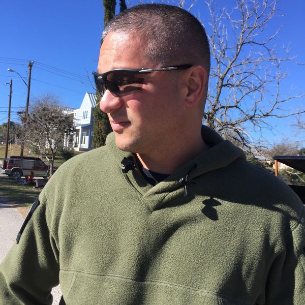 Allen Elishewitz A wearing eyeglass With looking