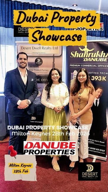 Three people at Dubai Property Showcase event.