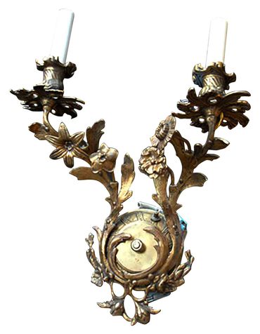 Antique two arm brass wall sconce.
New York Props