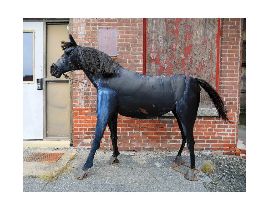Vintage steel pony sculpture.
New York Props