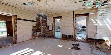 Dotson Cabin interior walls prior to de-construction. Note the kitchen fireplace (there is another on the opposite wall in the living room)