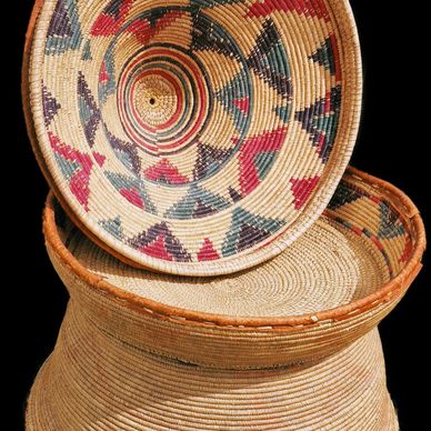 Harari Basket, a traditional woven basket made by the Harari tribe of Ethiopia. The  interior upper 