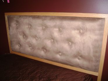 Tufted oak headboard. 