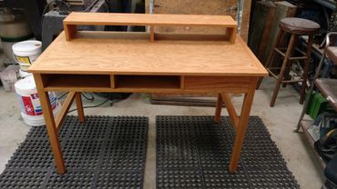 Oak computer desk with storage cubbies. Soft close drawer slides. 