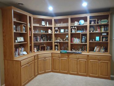 Oak built-in cabinets and bookshelves built to match existing woodwork. Soft close hardware.  