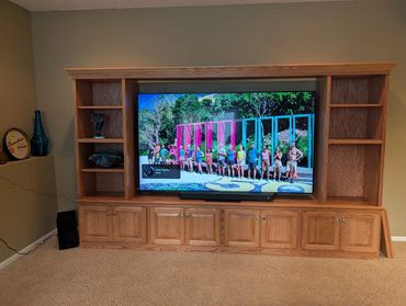 Just completed and installed this oak TV cabinet w/shelves and trimmed with top crown molding for a 