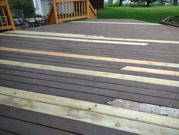 Removed and replaced rotted deck boards with green treated boards 