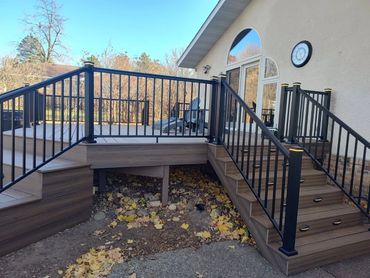 Old decaying cedar decking and posts - Gone! Installed Trex decking for durability and style. AFCO a