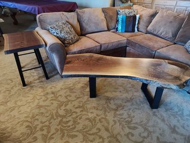 Walnut live edge coffee table with matching end table.  Sturdy steel legs. Satin finish.  