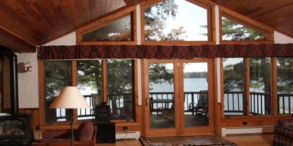 large living room with access to the deck