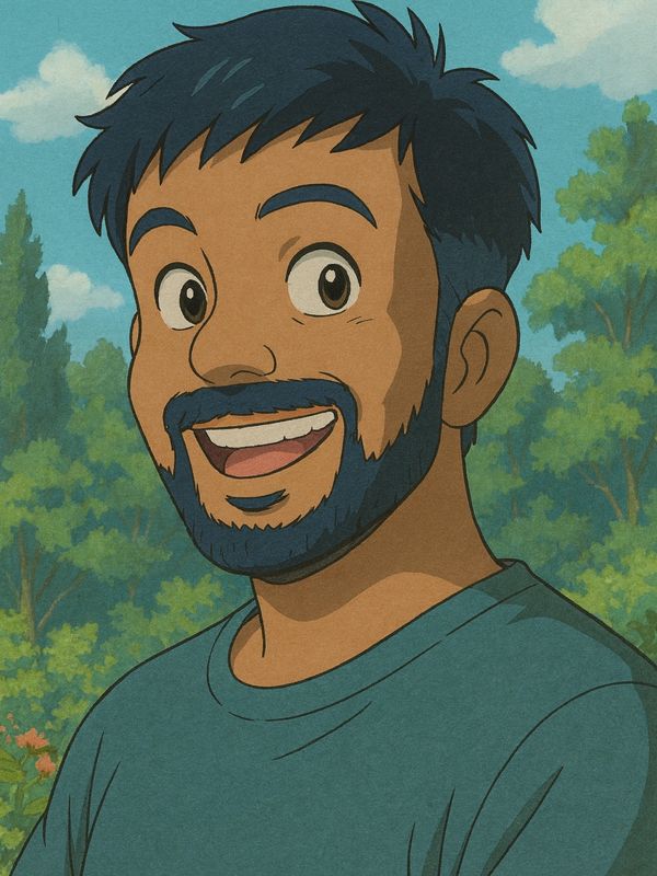Animated smiling man with a beard in a green shirt outdoors.