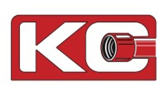 Logo with letters KC and a lens element.