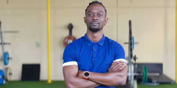 Coach Nuru arms crossed