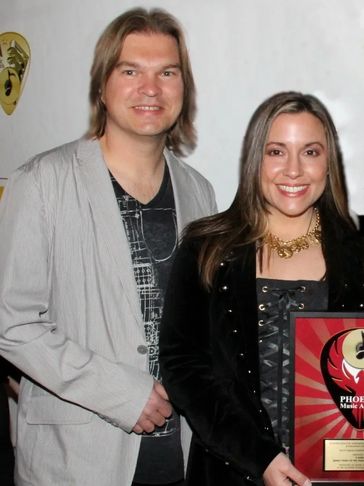 Gary Bettum & Gina Donello accepting their "Music Video of the Year" award at Phoenix Music Awards