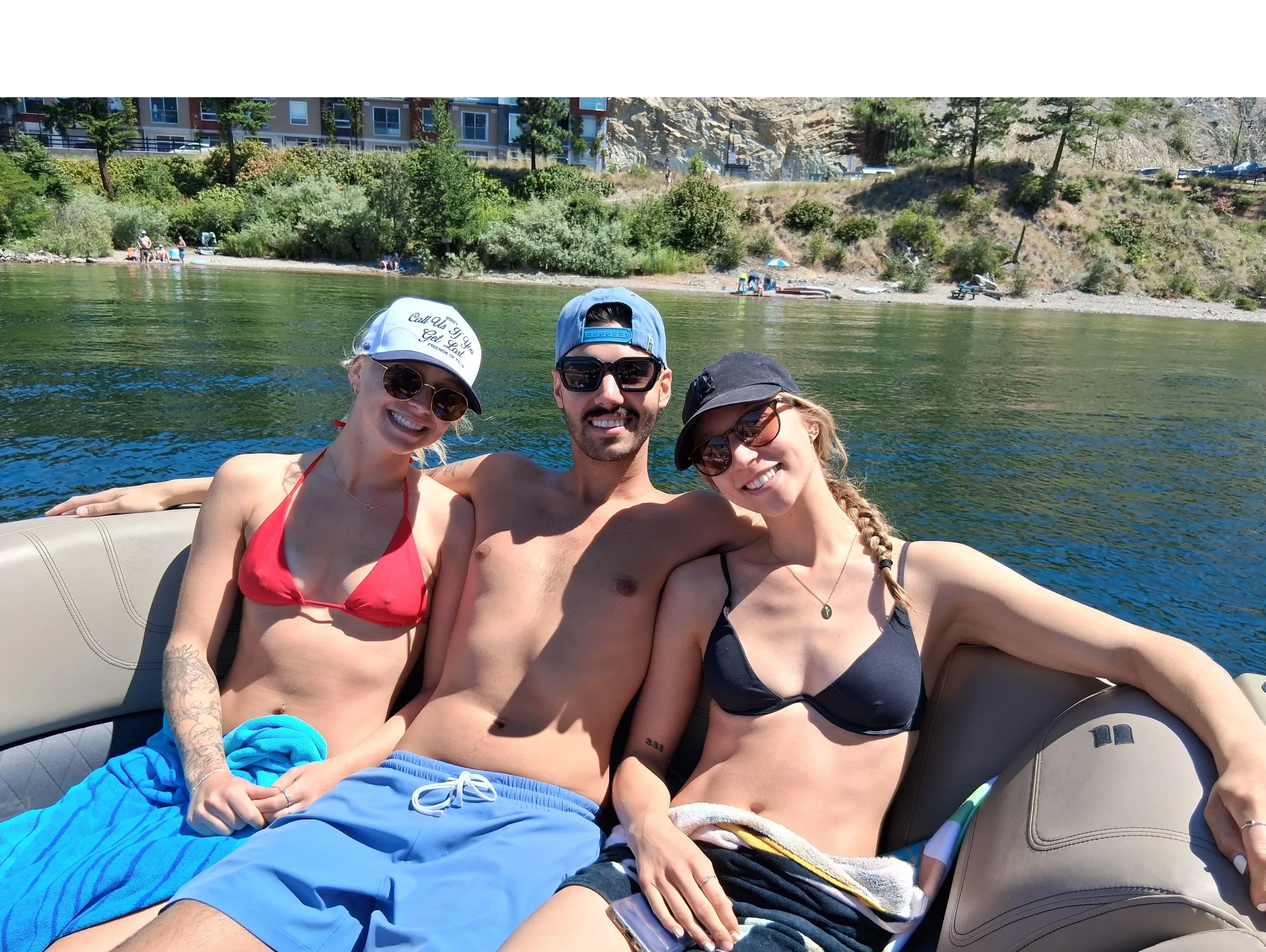 Private pontoon boat charter exploring Okanagan Lake in Kelowna.