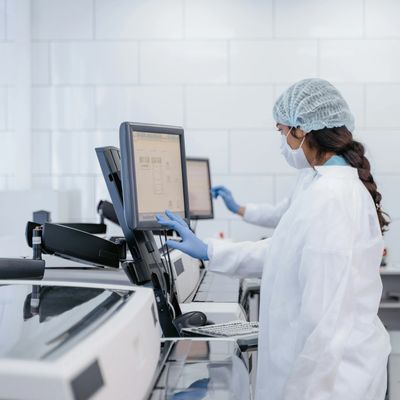 Laboratory tech performing drug testing analysis