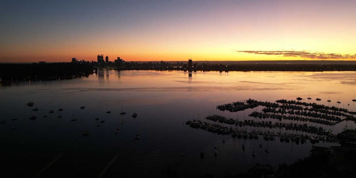 Perth city skyline, Royal Perth Yacht Club at sunrise