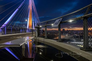 Absolutly incredible reflection photo of the International Gateway Bridge in Long Beach from the top