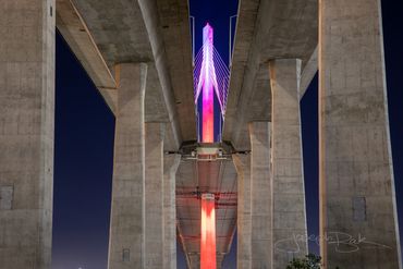 The International Gateway Bridge from its foundations mid color change capturing a rainbow of colors