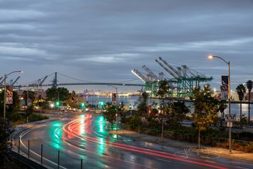 San Pedro, California. Sunrise long exposure photo of the Port of Los Angeles with rain reflections.