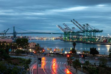 San Pedro, California. Sunrise long exposure photo of the Port of Los Angeles with rain reflections.