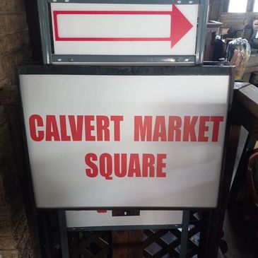 Signboard indicating Calvert Market Square.