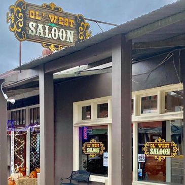 Exterior of an Old West Saloon with vintage signage.