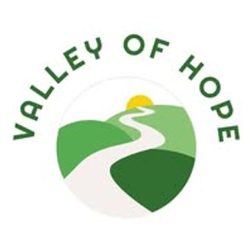 Logo with a winding path and sun, labeled Valley of Hope.