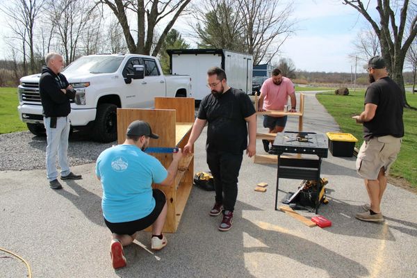 The guys hard at work building shelves for our evangelism trailer