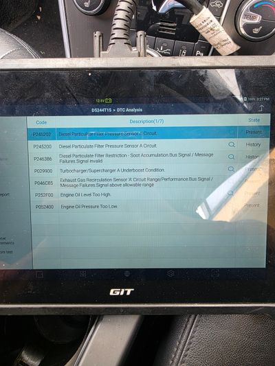 Diagnostic scan showing various diesel particulate filter and engine pressure sensor codes.