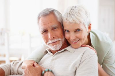 Retired couple looking forward after planning retirement