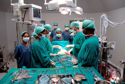 Doctor and surgens in operating room